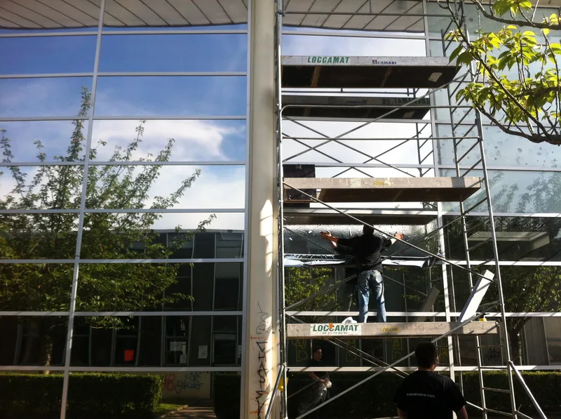 Pose de film solaire — Salle de sport